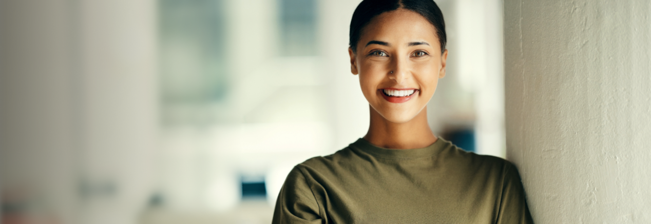 A smiling Canadian Forces personnel eligible for GMC's Canadian Forces Bonus Program.