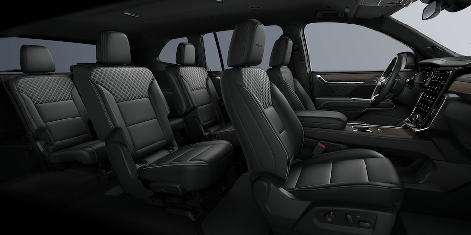 2024 GMC Acadia Denali front interior seats: After Dark.