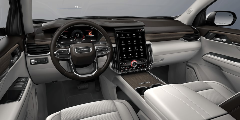 2024 GMC Acadia Denali front interior: Sheer Grey/Very Dark Atmosphere.