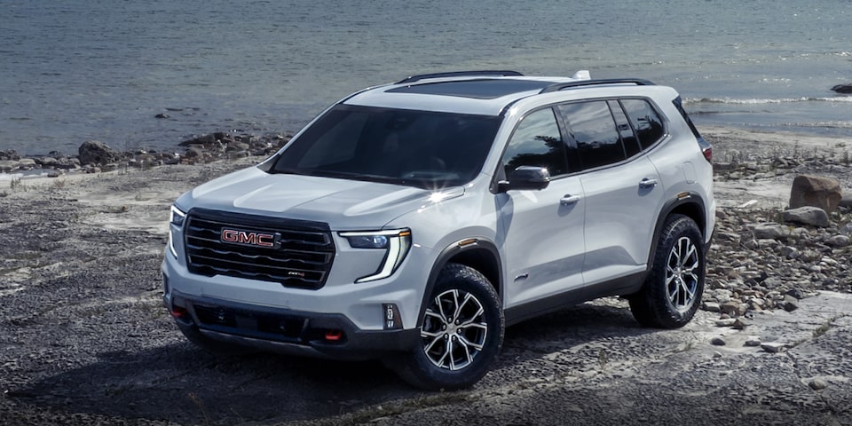 Top-side view of the 2024 GMC Acadia AT4 in Nightrider chrome exteriors.