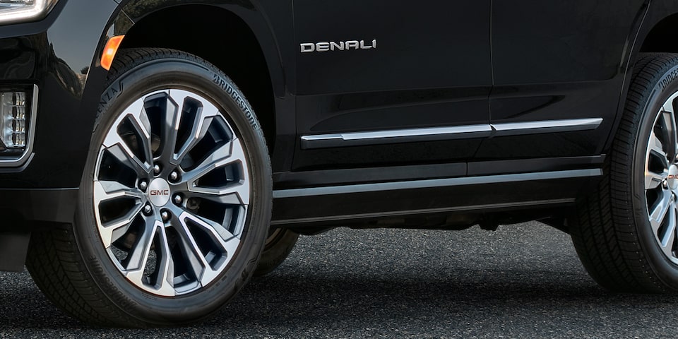 Closeup view of the wheels of the GMC Yukon Denali.