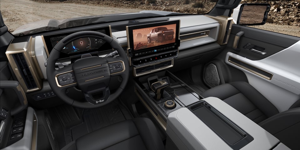 Driver's view of the front interior inside the 2025 GMC Hummer EV SUV.