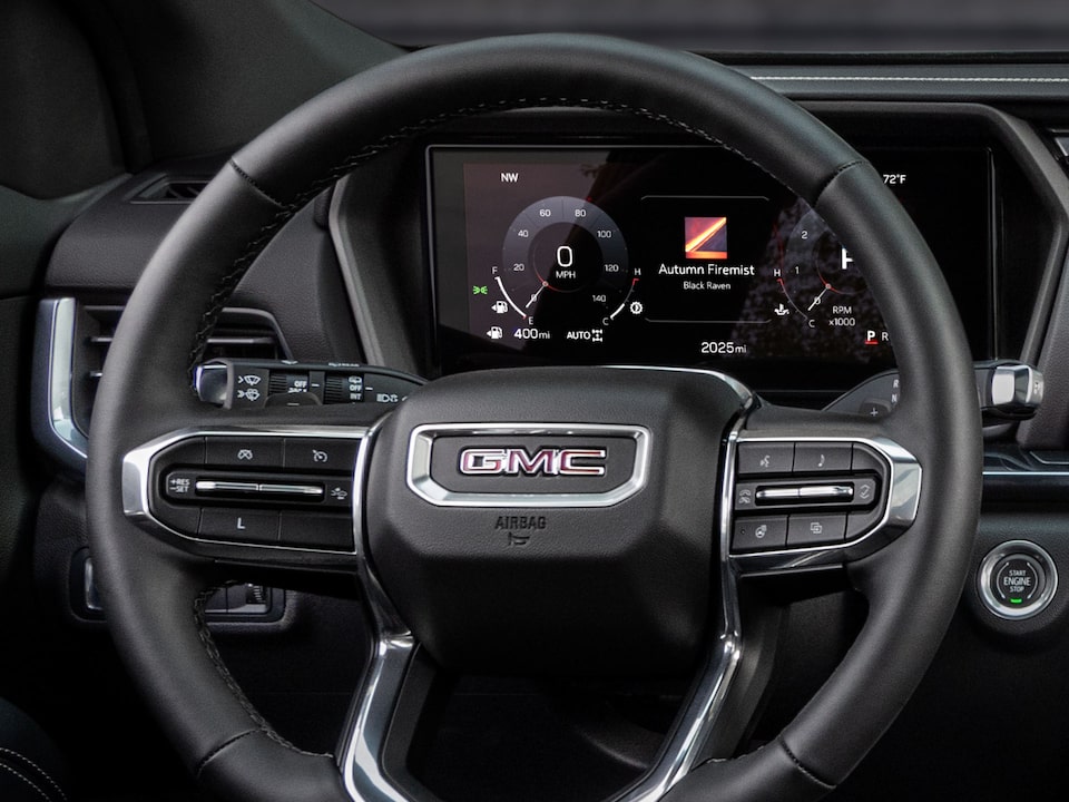 Close up view of the steering wheel of the 2025 GMC Terrain.