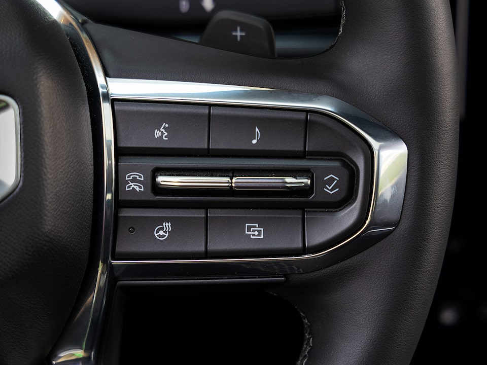 Close up view of the buttons on the steering wheel of the 2025 GMC Terrain.