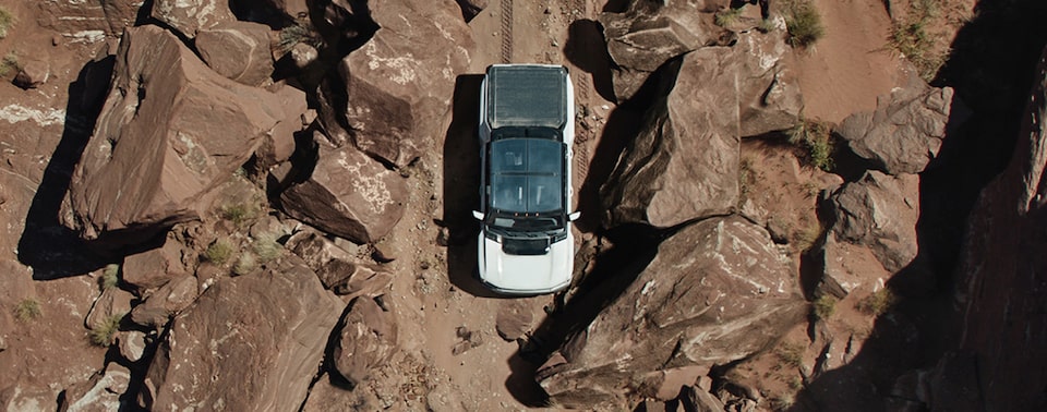 Overhead view of the GMC Hummer EV Pickup while driving off the road.