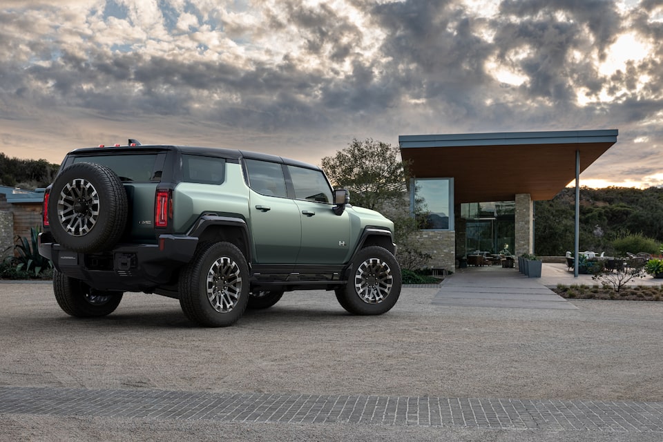 Scenic view of the GMC Hummer EV SUV in Moonshot Green Matte.