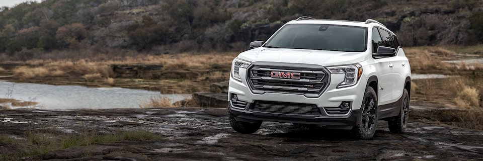 2024 GMC Terrain AT4 driving on a wetland.