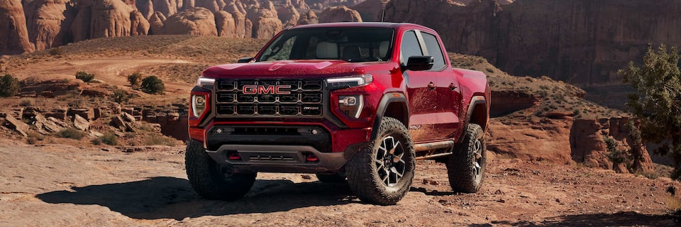 2025 GMC Canyon AT4 parked in a desert environment.