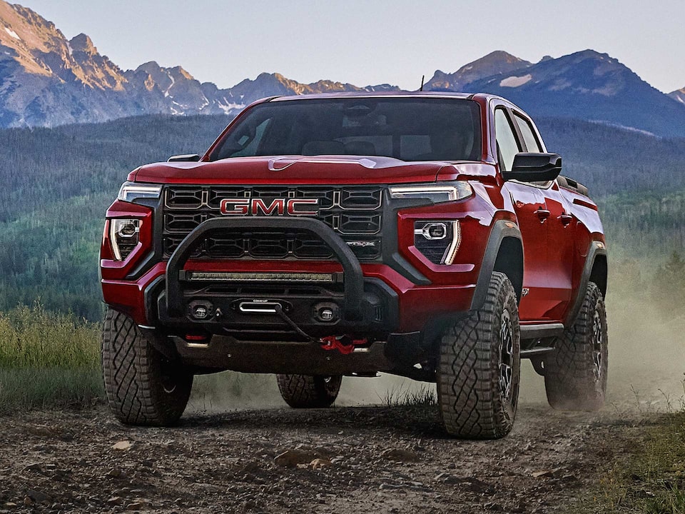 2025 GMC Canyon AT4 off-roading in a sunny day.