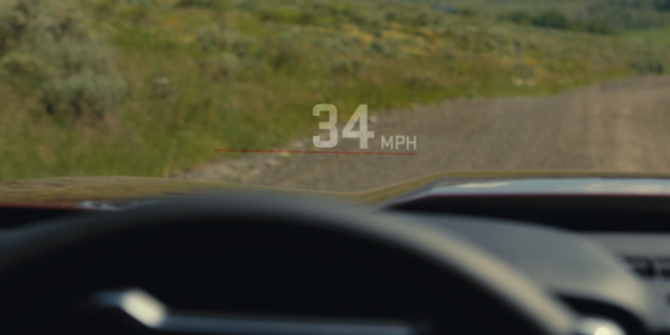 Close-up of the 2025 GMC Canyon AT4 Head-up Display on the Windshield.