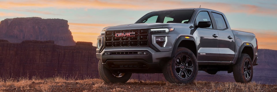 Three-quarter View of a 2025 Canyon Truck Parked in the Canyon Desert.