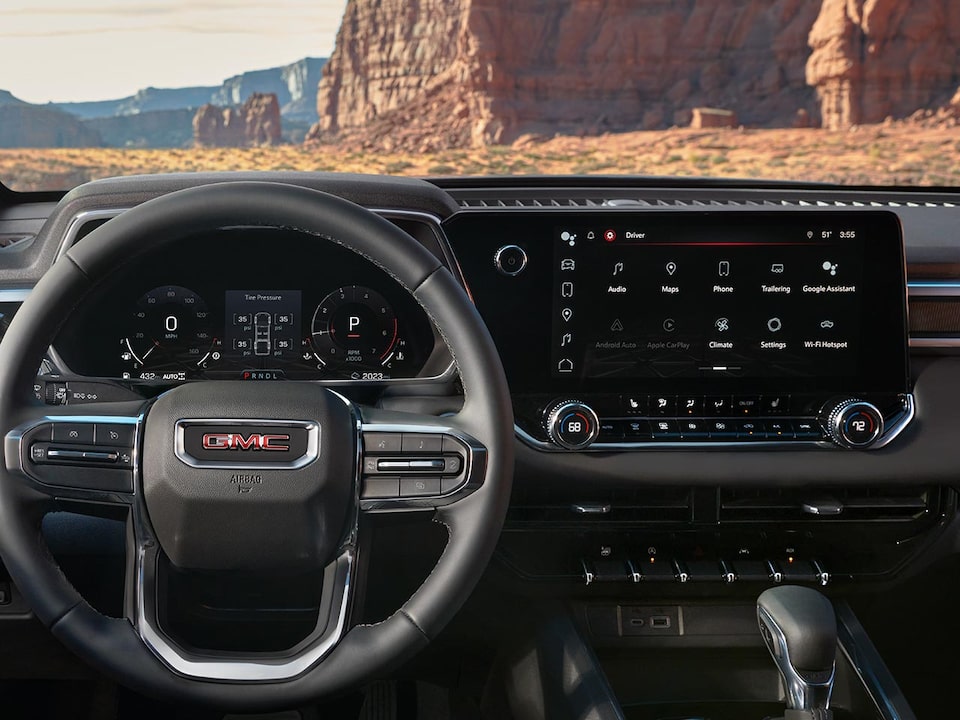 Driver's view of the 2025 Canyon Elevation Steering Wheel and Infotainment System.