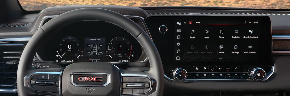 Driver's view of the 2025 GMC Canyon Elevation Steering Wheel and Infotainment System.