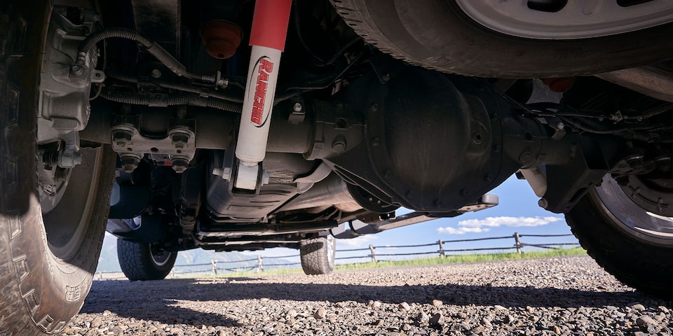 Close-up view of the Rancho Shocks underneath the 2025 GMC Sierra HD AT4 truck.