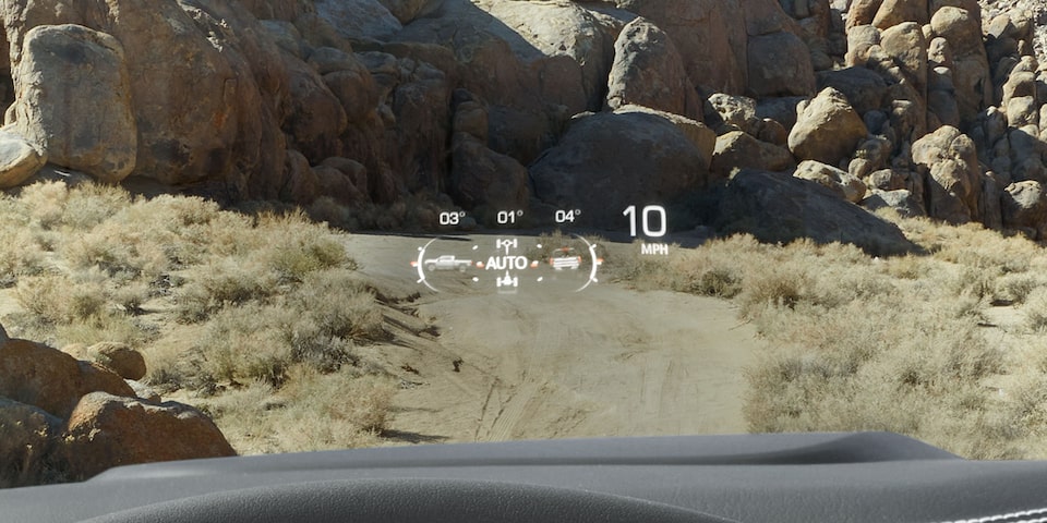 Close-up view of the Heads Up Display Feature in use in the 2025 GMC Sierra HD AT4 Truck.