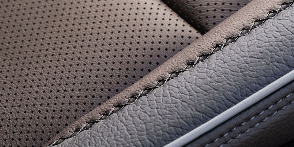 Close-up view of the intricate seat stitching in a 2025 GMC Sierra HD Denali Truck.