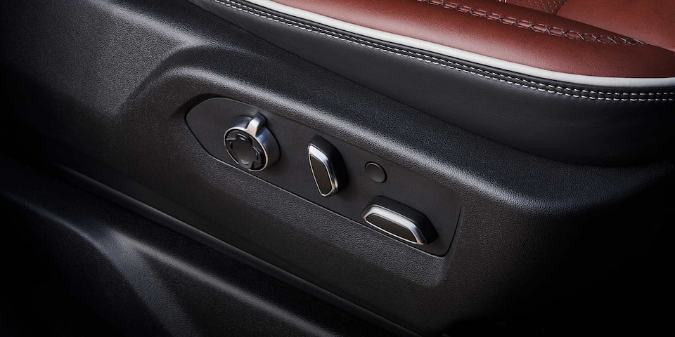 Close-up view of the Seat Controls in a 2025 GMC Sierra HD Denali Truck.