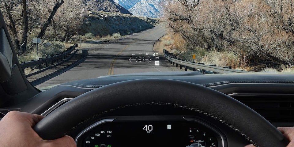 Close-up View of the Heads Up Display Feature in Use in a 2025 GMC Sierra HD Denali Truck.