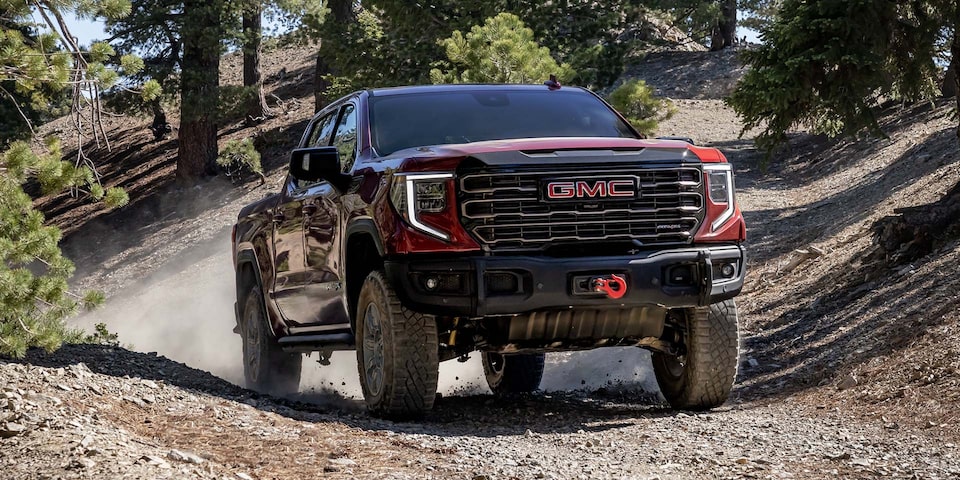 Front View of the Sierra AT4 Driving Down an Off-Road Trail