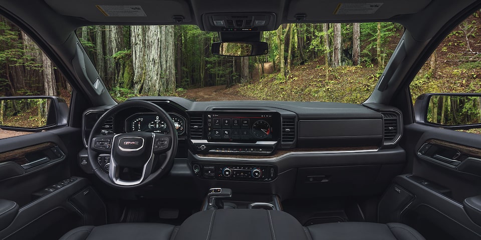 Interior View of the Steering Wheel and Dashboard of the GMC Sierra 1500