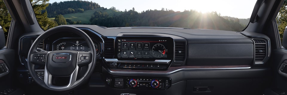 Interior View of the Steering Wheel and Dashboard in the GMC Sierra 1500