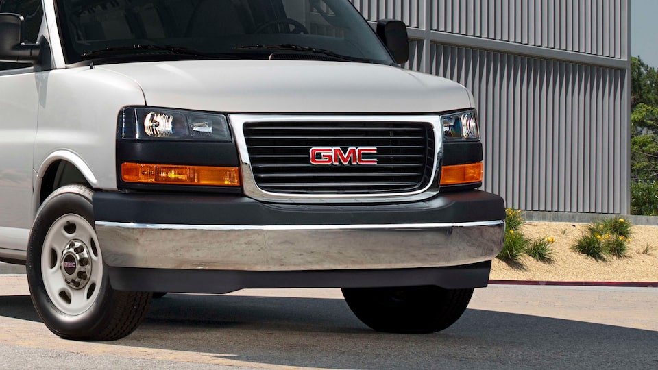 GMC Savana Passenger van front exterior view.