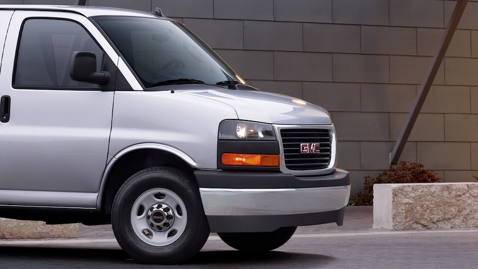 GMC Savana Passenger deep-tinted windows.