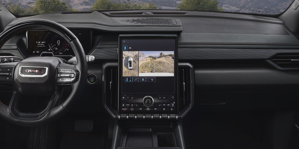 Front view of the infotainment screen of the 2025 GMC Acadia AT4.