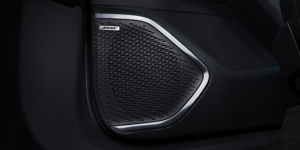 Close up view of the Bose Audio System of the 2025 GMC Acadia AT4.