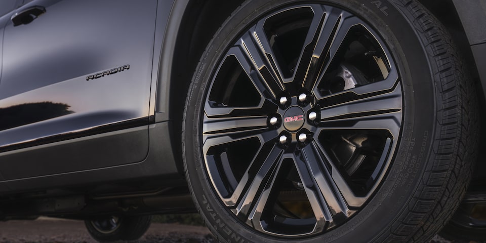 Close up view of the aluminum wheels on the 2025 GMC Acadia Elevation.