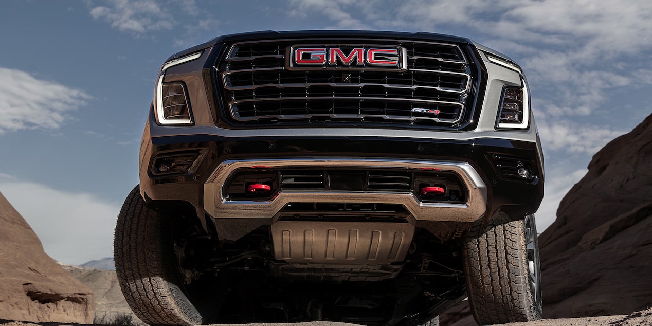 Front View of the Undercarriage and Grille of the 2025 GMC Yukon.