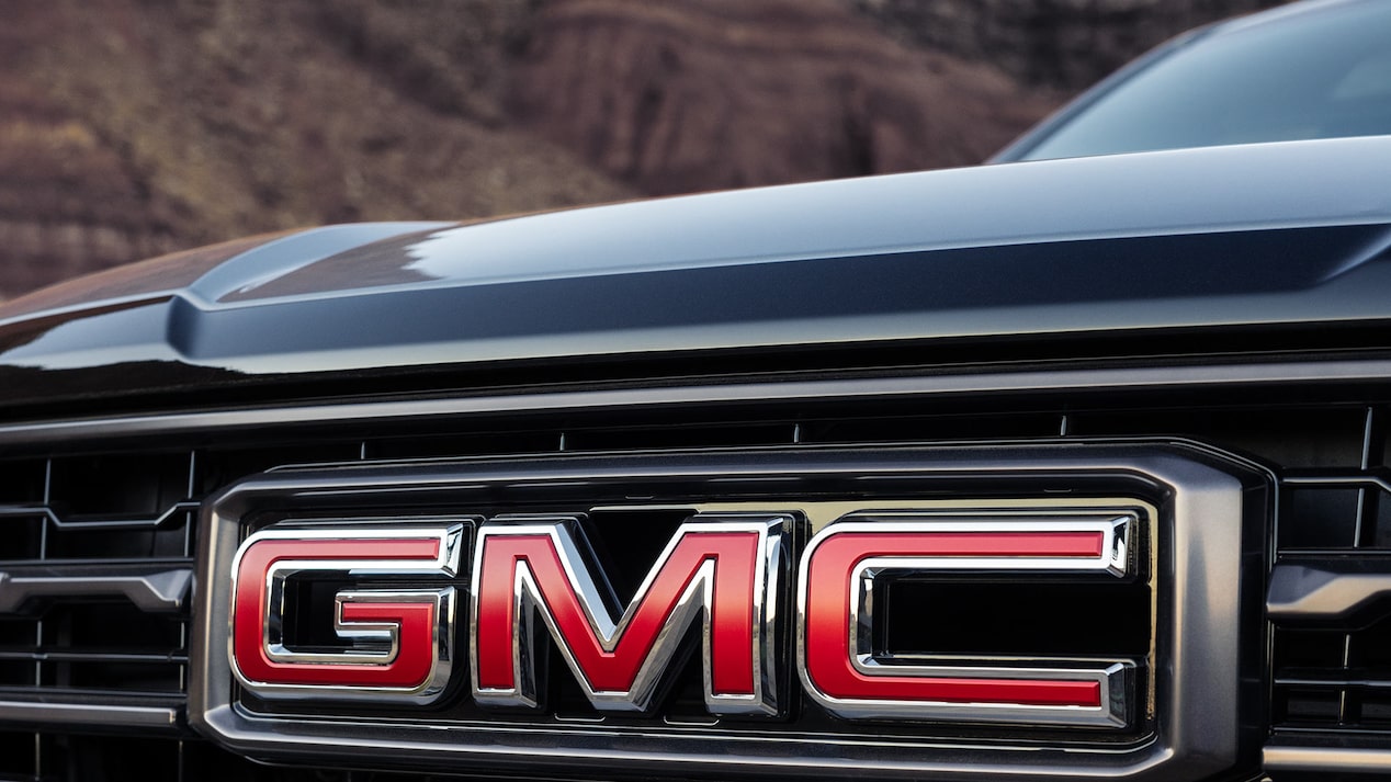 Close-up view of the front GMC Badging on the Grille of the 2025 GMC Yukon SUV.