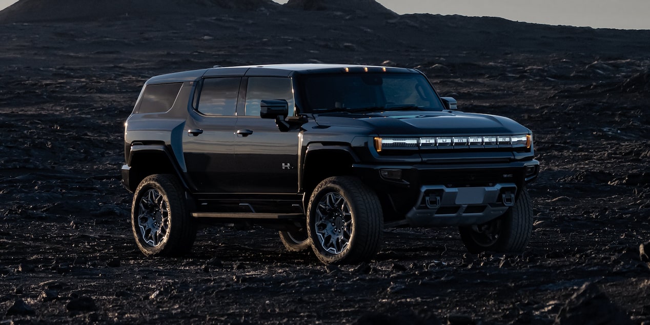 Front-side view of the GMC HUMMER EV Pickup Truck parked alone.