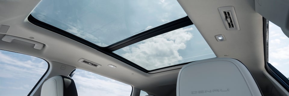 Interior perspective of the 2024 GMC Acadia Denali sunroof.