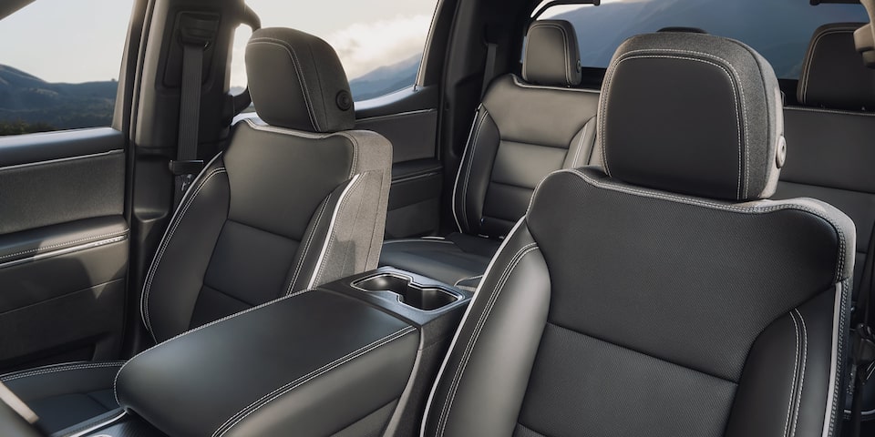 2026 GMC Sierra EV Premium Seating of the Front and Back Row.