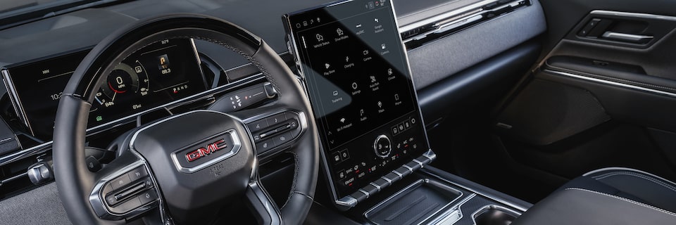 Close-up View of the Steering Wheel in the 2026 GMC Sierra EV.