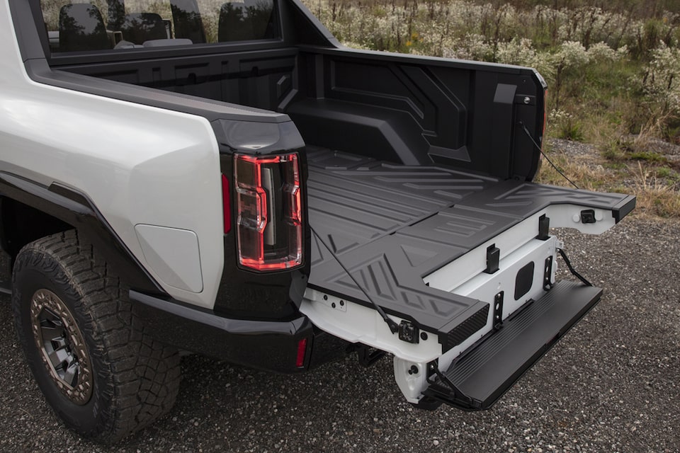 Open tailgate of the GMC Hummer EV Pickup.