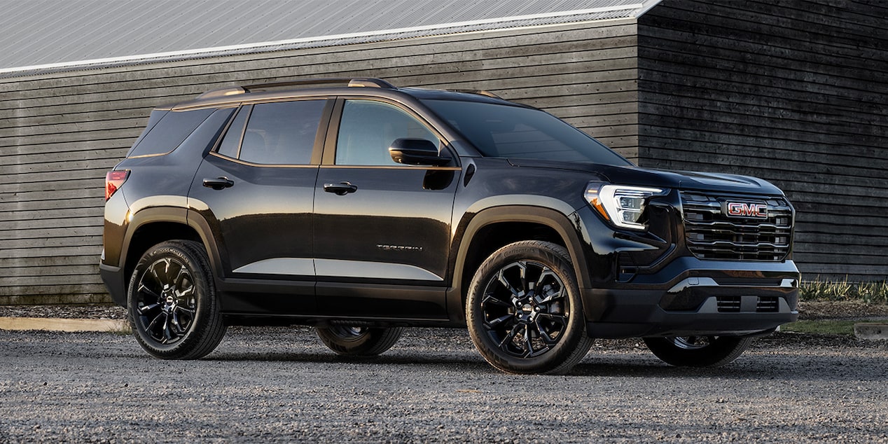 Front-side view of the 2025 GMC Terrain parked outdoors.