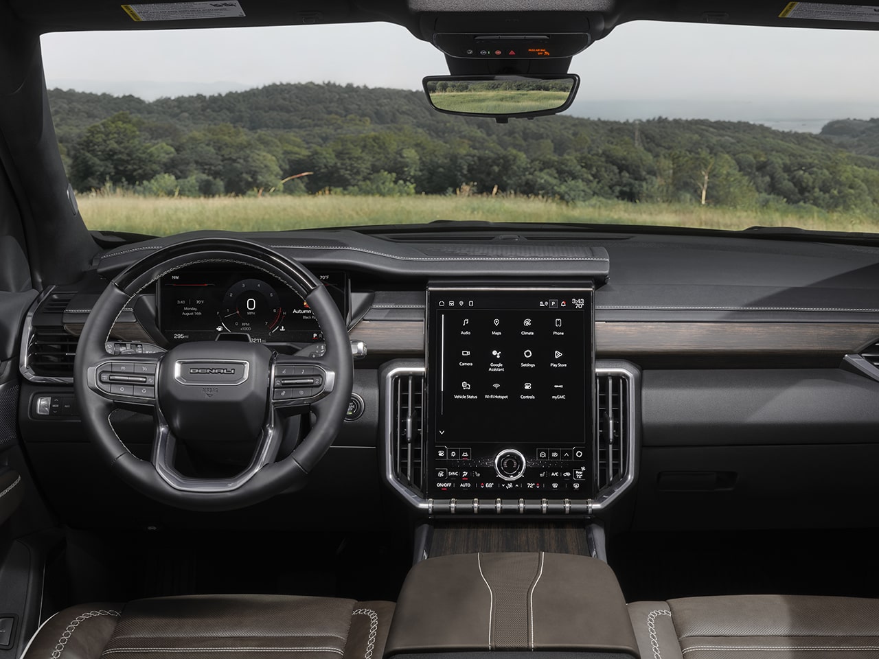 Spacious front interiors of the 2026 GMC Acadia Denali Ultimate.