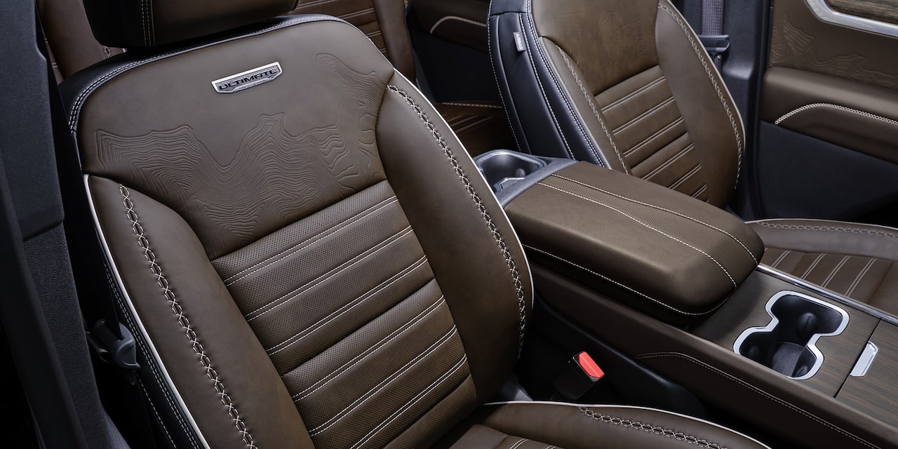 Close-up of the Leather Front Row Seats of the 2026 GMC Acadia Denali Ultimate.