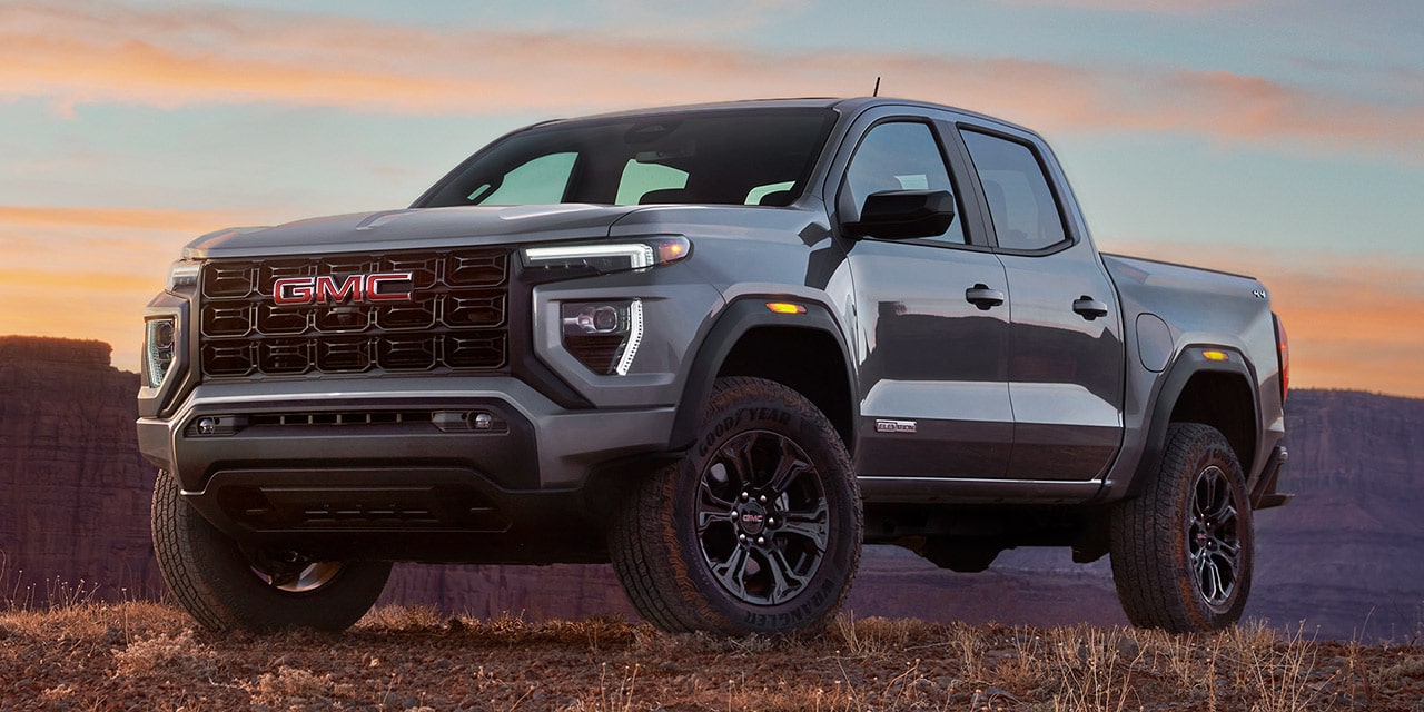 Exterior View of the GMC Canyon Pickup Truck parked off-road over a rough terrain.