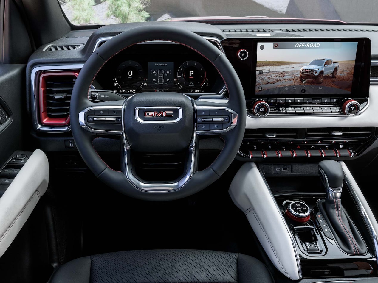 Driver's perspective of the sleek interiors of the 2024 GMC Canyon.