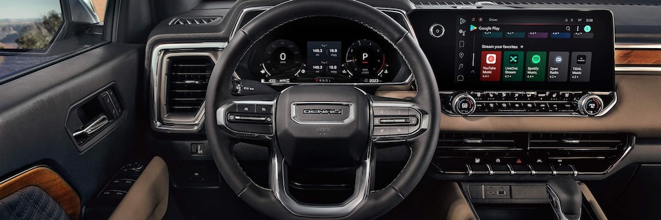 An Overview of the Front interiors of the 2025 GMC Canyon Denali.