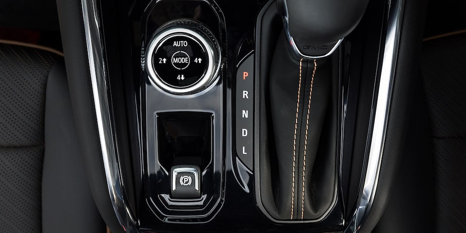 Close-up view of the 2025 GMC Canyon Truck's Selectable Drive Modes Knob and Shifter.