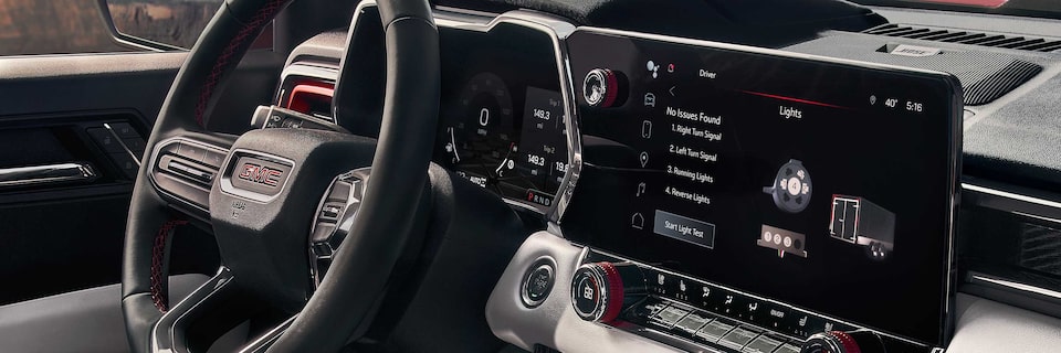 Front passenger's view of the front interiors of the 2025 GMC Canyon Pickup Truck.