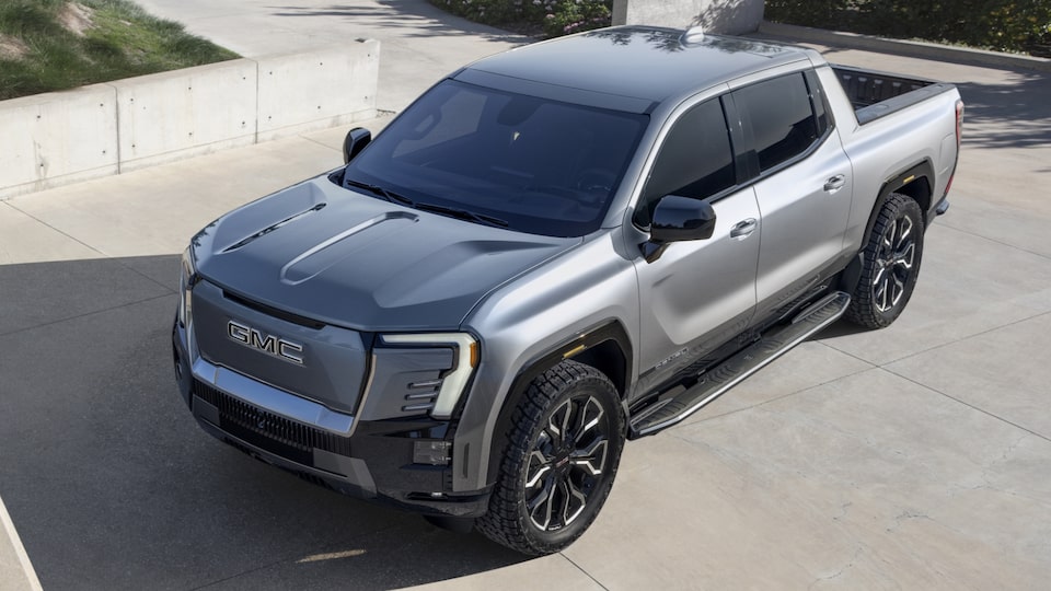 A Aerial View Of the GMC Sierra EV Denali Parked On-Road in a Driveway