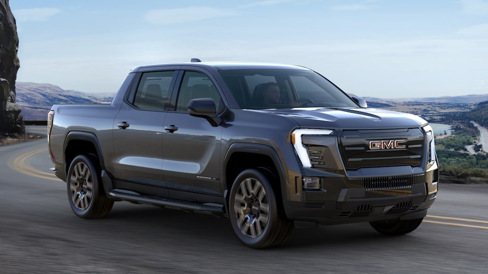 The Stunning New GMC Sierra EV Denali Driving On-Road With a Valley